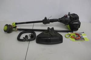 lot 72 image: RYOBI-4-Cycle 30cc Attachment Capable Straight Shaft Gas Trimmer .