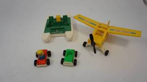 lot 62 image: Vintage Fisher Price Yellow 1976 Airplane  1970s Fisher Price Pontoon Boat  2 Little People Cars with 1 Wooden Girl
