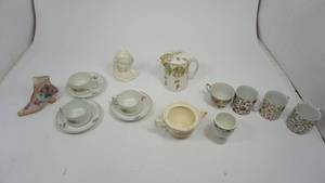 lot 101 image: Vintage Edwin M. Knowles China Co. Floral Pitcher and Imperial H & Co. Selb Bavaria Tea Cups, Saucers