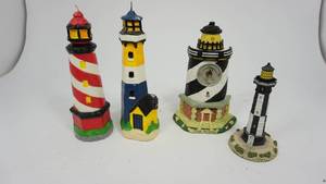 lot 118 image: 2 Lighthouse Candles  Lighthouse Wall Clock  Ceramic Lighthouse Decor