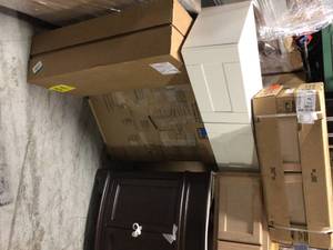 Pallet with assorted Cabinets and vanities see pictures