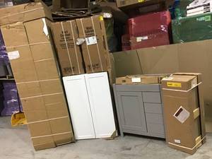 Pallet with assorted cabinets and vanities various models and conditions see pictures