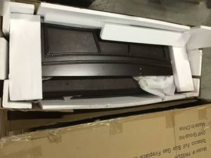 Pleasant 20,000 BTU 36 in. Compact Convertible Ventless Natural Gas Fireplace in Tobacco see pictures open box customer return