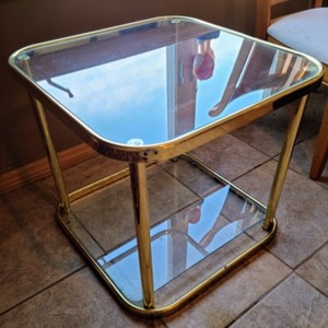 lot 22 image: Glass Topped Gold Accent Table