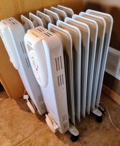 lot 38 image: Pair of Warm Fusion Space Heaters