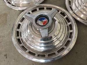 lot 148 image: Set of Four Spinner Hubcaps