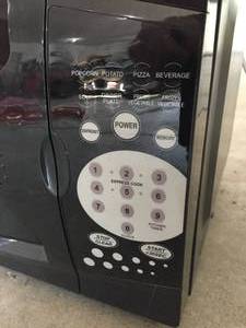 lot 153 image: Magic Chef Microwave