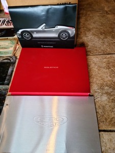 lot 82 image: Variety of Vintage Car Manuals And More