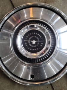 lot 95 image: Pair of Ford Thunderbird Hubcaps
