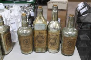 Lot of (4) Le Jardin de Parisienne Decorative Bottles