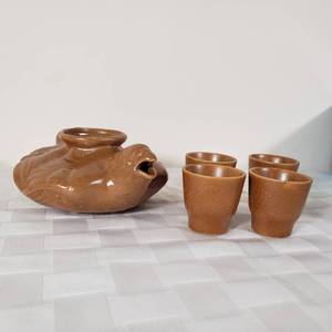 lot 176 image: Vintage Saki Set with Eagle Motif Carafe