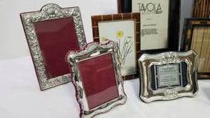 lot 184 image: Collection of 10 Picture Frames in Wood & Silver