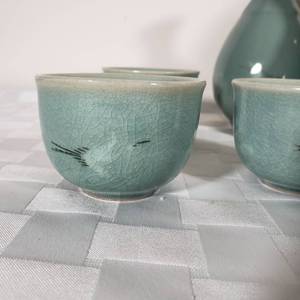 lot 161 image: Collection of Japanese Celanese Vases and Saki Set