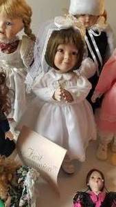 lot 124 image: Collection of 12 Dolls