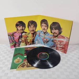lot 81 image: Vintage Beatles St. Peppers Record Album Vinyl LP