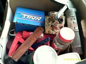 box of misc nails ,bolts , caulking...