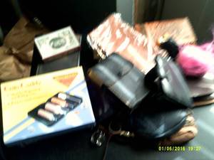 bag of wallets ,coin purses, clocks...