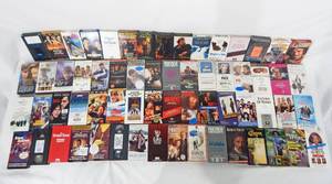 lot 100 image: Huge Lot of 63 Vintage VHS Movies - Most Are Promotional Screening Tapes
