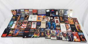 lot 101 image: Huge Lot of 60 Vintage VHS Movies - Most Are Promotional Screening Tapes