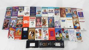 lot 104 image: Lot of 40 Vintage VHS Movies - Most Are Promotional Screening Tapes - Mainly Family and Kid Friendly Comedy Movies