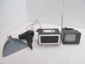 lot 6 image: clock, mini TV, dust pan, hair blower
