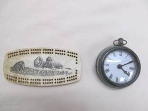 lot 18 image: watch, cribbage board