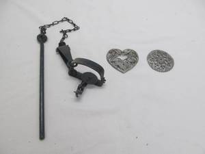 lot 19 image: trap, belt buckles