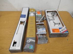 Assorted lot of towel bars  paper holders  hooks