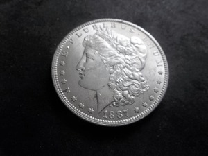 1887 O Morgan Silver Dollar