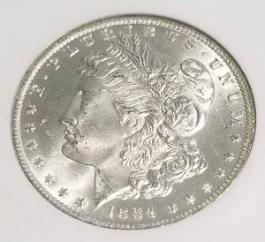 1884-O MORGAN SILVER DOLLAR MS64 NGC