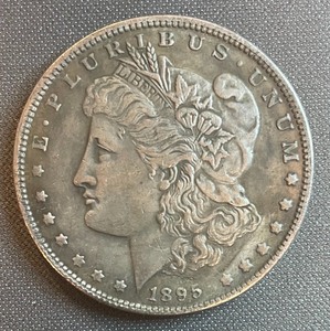 lot 38 image: 1895 Double Sided Dollar Token
