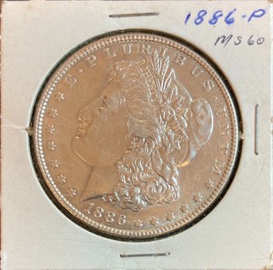 lot 26 image: 1886 Morgan Dollar - High Grade