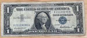 lot 31 image: 1957 $1 Silver Certificate - X21109090A