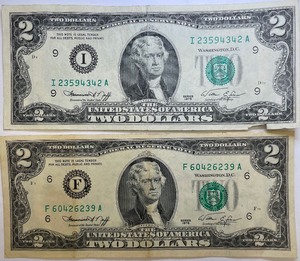 Two 1976 $2 Bills - I23594342A & F60426239A