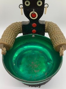 lot 35 image: Folk Art Bottle Cap Server Figurine