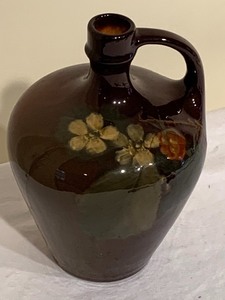lot 124 image: Rozane- Early Roseville  Pottery Jug with Floral Design