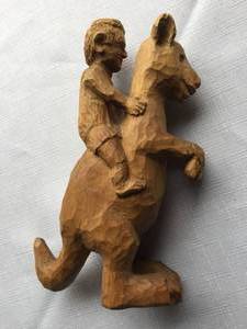 lot 329 image: Man on Kangaroo Carving