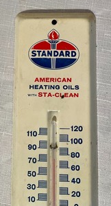 lot 176 image: Standard American Oils Metal Thermometer