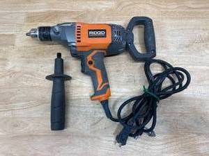 lot 39 image: RIDGID 9 Amp Corded 12 in. Spade Handle Mud Mixer
