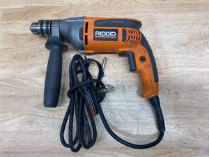 lot 40 image: RIDGID 8 Amp Corded 12 in. Heavy-Duty Variable Speed Reversible Drill