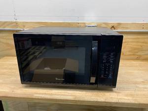 lot 89 image: MAGIC CHEF 1.6 cu. ft. Countertop Microwave in Black with Gray Cavity