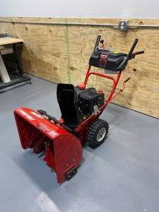 lot 1 image: TROY-BILT 24 in. 208 cc Two-Stage Gas Snow Blower with Electric Start Self Propelled