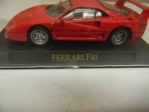 143 SCALE DIECAST FERRARI F40 RED - NEW - IN CASE - SEE PICTURES
