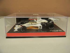 143 SCALE DIECAST McLAREN FORD M23 N0. 7 D. HULME 1973 - NEW - IN CASE - SEE PICTURES