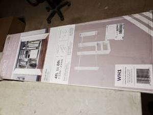 lot 68 image: 4ft-8ft Deluxe Starter Closet Kit- Missing Some pcs.
