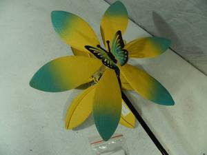 lot 12 image: New Double Sided Wind Spinner with Solar Light