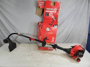 lot 7 image: Craftsman Gas Power Multi-Tool  Weed Wacker