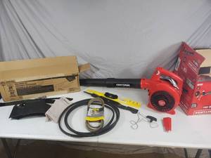 lot 115 image: Craftsman Blower for Repair, Troy-Bilt Mulching Kit, Mower Blades, Etc