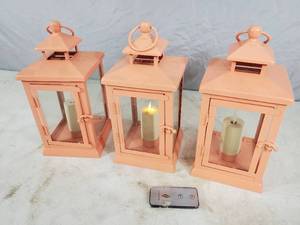 lot 249 image: 3 Luminara Lanterns with Candles and Remote
