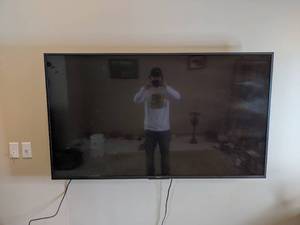 lot 76 image: 65 Wall Mount Sony Smart TV